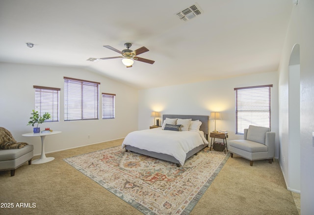 4609 E Ironhorse Rd, Gilbert, AZ 85297 - bedroom with carpet, lofted ceiling, multiple windows, arched walkways, and a ceiling fan