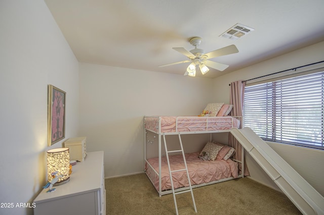 4609 E Ironhorse Rd, Gilbert, AZ 85297 - carpeted bedroom with baseboards and a ceiling fan