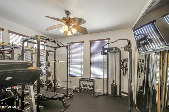 4609 E Ironhorse Rd, Gilbert, AZ 85297 - workout area featuring ceiling fan and baseboards