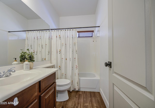 4609 E Ironhorse Rd, Gilbert, AZ 85297 - full bathroom featuring toilet, vanity, wood finished floors, and shower / tub combo with curtain