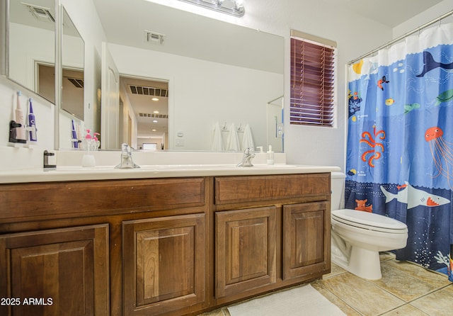 4609 E Ironhorse Rd, Gilbert, AZ 85297 - full bathroom featuring toilet, vanity, and tile patterned floors