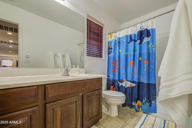 4609 E Ironhorse Rd, Gilbert, AZ 85297 - bathroom with toilet, vanity, and tile patterned floors