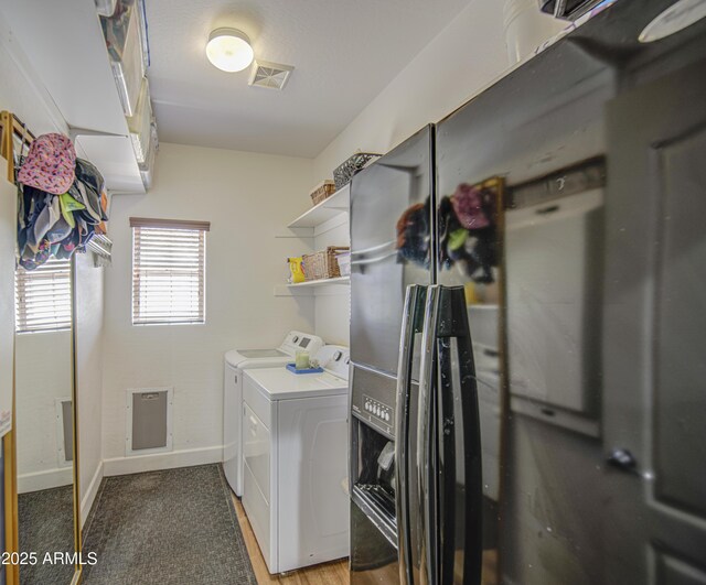 4609 E Ironhorse Rd, Gilbert, AZ 85297 - laundry area with washer and clothes dryer and baseboards