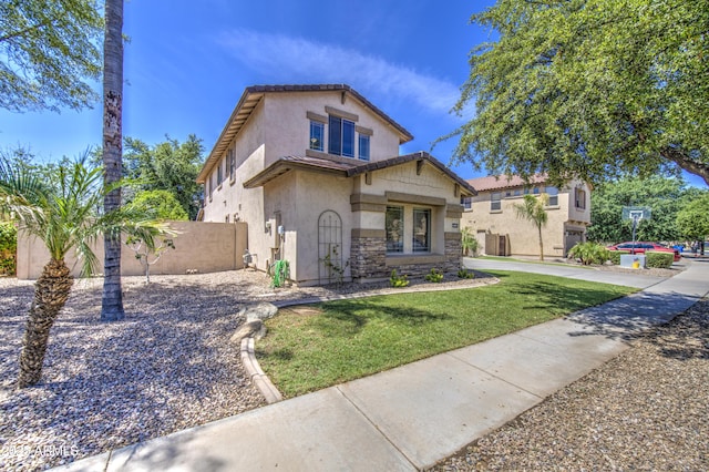 4609 E Ironhorse Rd, Gilbert, AZ 85297 - view of front facade with stucco siding and stone siding
