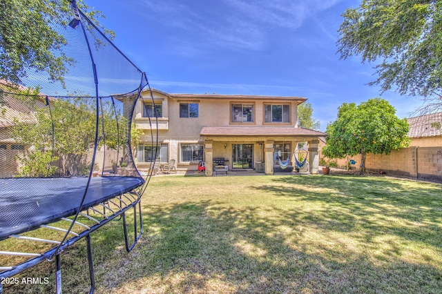 4609 E Ironhorse Rd, Gilbert, AZ 85297 - rear view of house featuring stucco siding