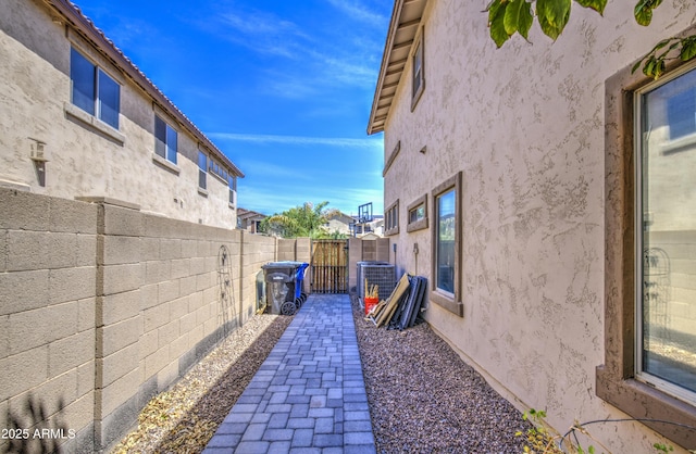 4609 E Ironhorse Rd, Gilbert, AZ 85297 - view of patio / terrace with a gate and cooling unit