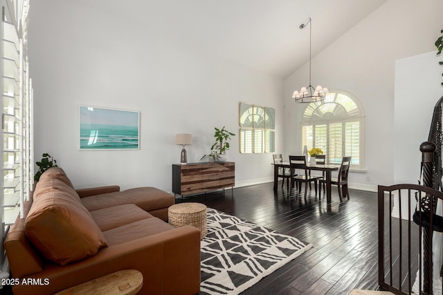 2026 E Cortez Dr, Gilbert, AZ 85234 - living area with high vaulted ceiling, a chandelier, dark wood-style floors, and baseboards
