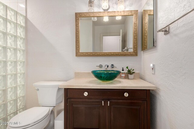 2026 E Cortez Dr, Gilbert, AZ 85234 - bathroom with vanity, toilet, and a textured wall