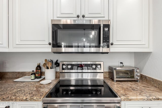 2026 E Cortez Dr, Gilbert, AZ 85234 - kitchen featuring appliances with stainless steel finishes, white cabinetry, and stone countertops