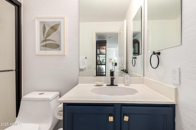 2026 E Cortez Dr, Gilbert, AZ 85234 - bathroom with toilet, vanity, and a textured wall