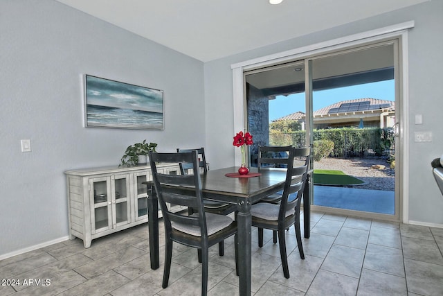 dining room with tile patterned floors