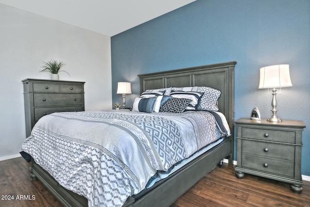 bedroom featuring dark hardwood / wood-style floors