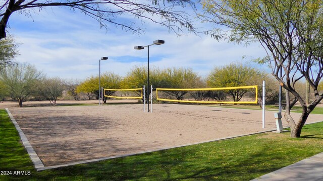 view of property's community featuring volleyball court