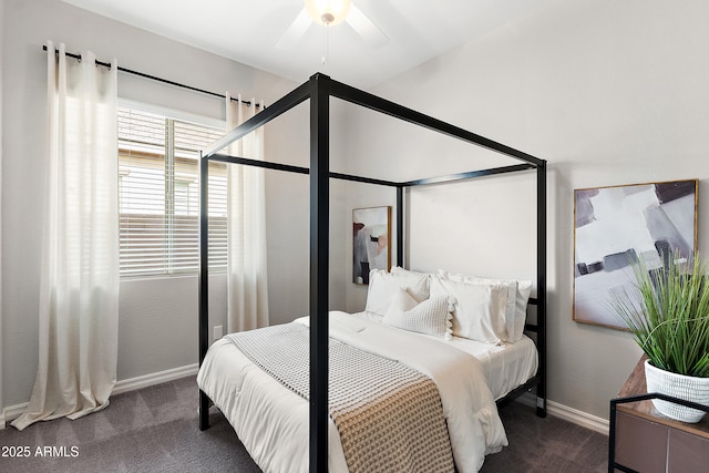 carpeted bedroom featuring baseboards