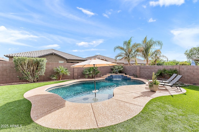 view of swimming pool with a lawn, a fenced in pool, a fenced backyard, and a patio area