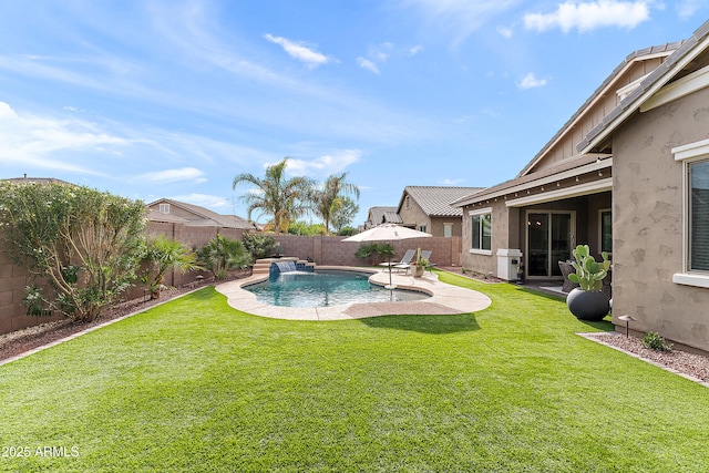 view of swimming pool featuring a lawn, a fenced in pool, a fenced backyard, and a patio area