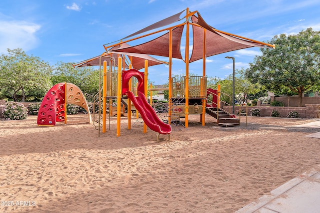 community jungle gym with fence