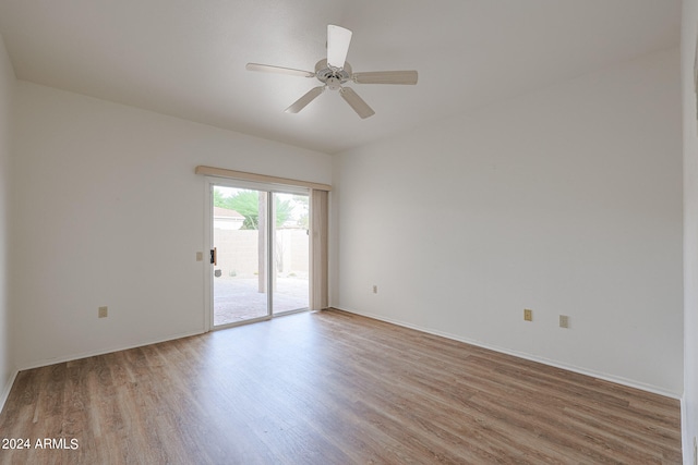 unfurnished room featuring ceiling fan and light wood-type flooring