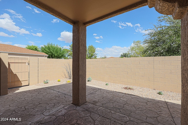 view of patio / terrace featuring a shed