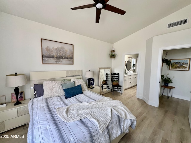 4925 W Bluefield Ave, Glendale, AZ 85308 - bedroom featuring lofted ceiling, light wood finished floors, ensuite bath, and ceiling fan