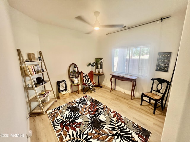 4925 W Bluefield Ave, Glendale, AZ 85308 - sitting room with light wood-style floors and ceiling fan