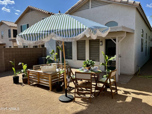 4925 W Bluefield Ave, Glendale, AZ 85308 - back of house featuring stucco siding, a patio area, and an outdoor hangout area