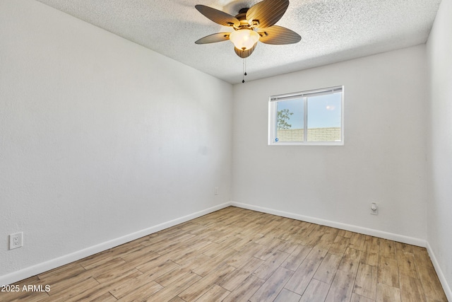 2706 W Isabella Ave, Mesa, AZ 85202 - unfurnished room featuring a textured ceiling, wood finished floors, and ceiling fan