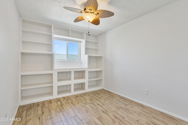 2706 W Isabella Ave, Mesa, AZ 85202 - spare room featuring a textured ceiling, wood finished floors, and ceiling fan