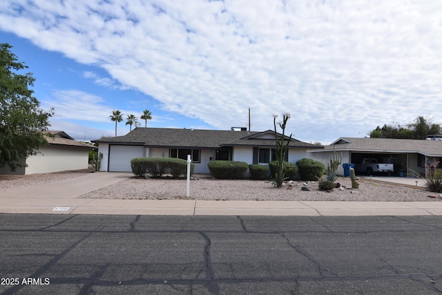 5720 E University Dr, Mesa, AZ 85205 - single story home with driveway and an attached garage
