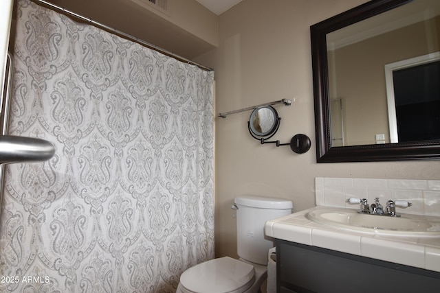 5720 E University Dr, Mesa, AZ 85205 - bathroom with toilet, vanity, and a shower with shower curtain
