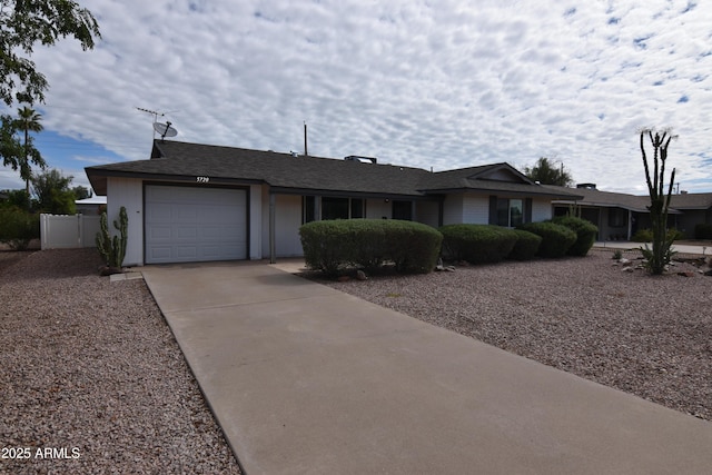 5720 E University Dr, Mesa, AZ 85205 - ranch-style house with an attached garage and driveway