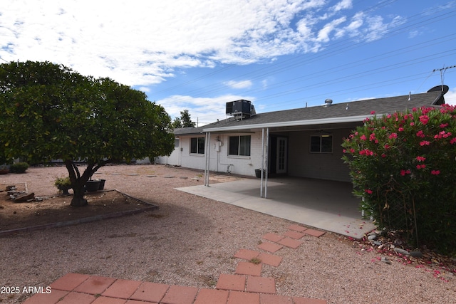 5720 E University Dr, Mesa, AZ 85205 - back of house featuring a patio and central air condition unit