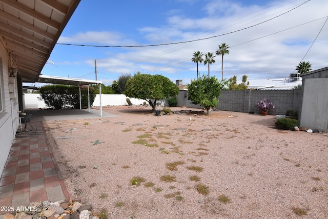 5720 E University Dr, Mesa, AZ 85205 - fenced backyard featuring a patio area