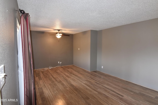 5720 E University Dr, Mesa, AZ 85205 - empty room featuring ceiling fan, wood finished floors, and a textured ceiling