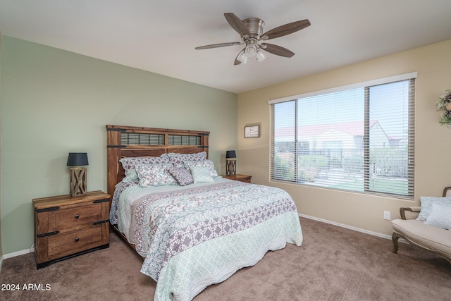 26404 W Zachary Dr, Buckeye, AZ 85396 - bedroom featuring carpet flooring, baseboards, and a ceiling fan