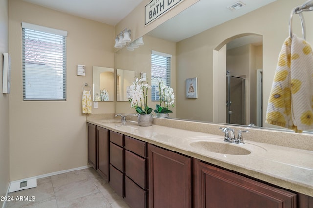 26404 W Zachary Dr, Buckeye, AZ 85396 - bathroom with a wealth of natural light, a sink, and visible vents