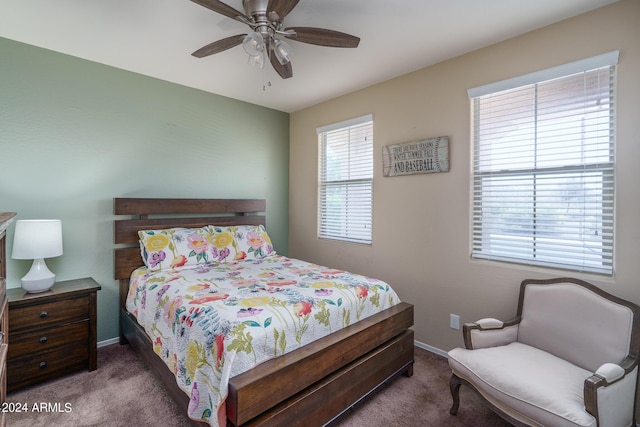 26404 W Zachary Dr, Buckeye, AZ 85396 - carpeted bedroom featuring baseboards and ceiling fan