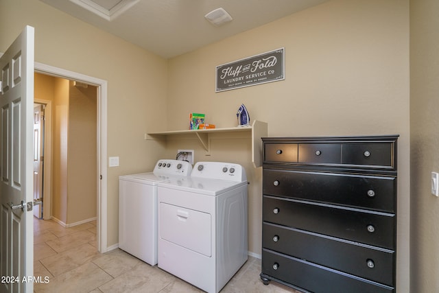 laundry area with washer and dryer