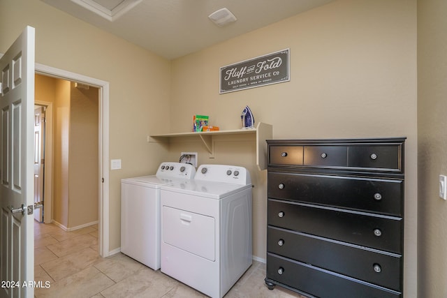 26404 W Zachary Dr, Buckeye, AZ 85396 - laundry area featuring baseboards, washer and clothes dryer, laundry area, and light tile patterned flooring