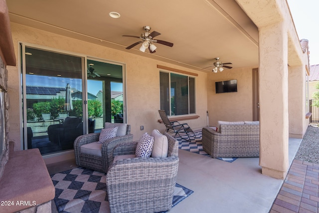 view of patio featuring ceiling fan