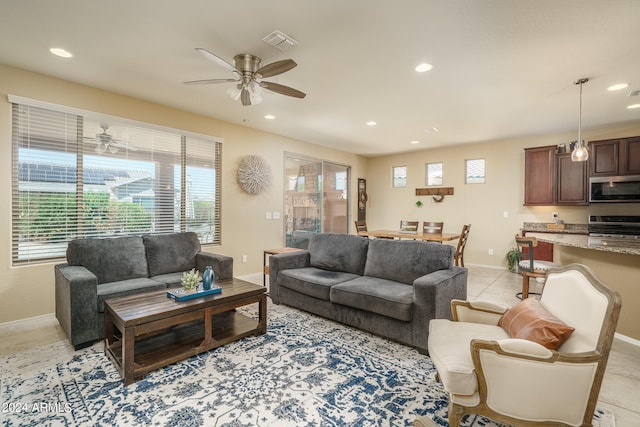 living room featuring ceiling fan