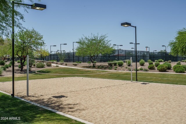 26404 W Zachary Dr, Buckeye, AZ 85396 - view of home's community featuring volleyball court, fence, and a yard