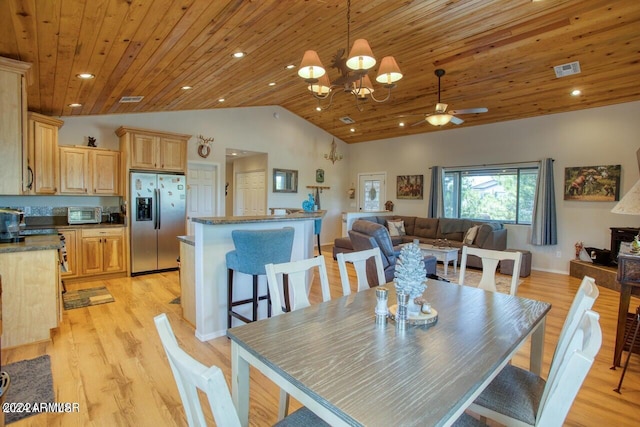 dining space with wood ceiling, light hardwood / wood-style flooring, high vaulted ceiling, and ceiling fan with notable chandelier