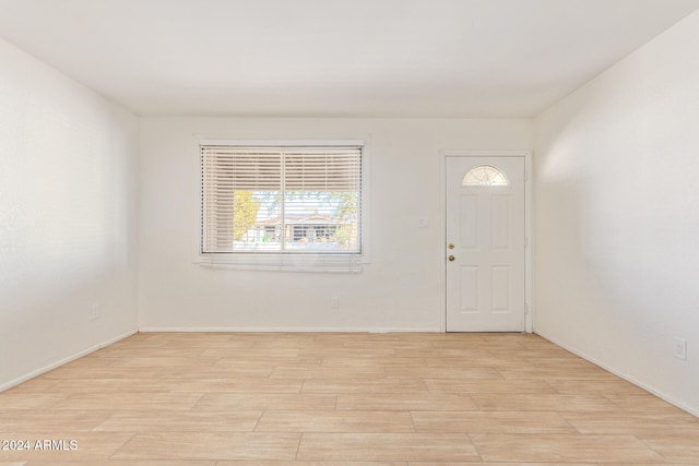 entrance foyer with light wood-type flooring