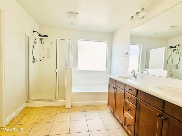 bathroom with vanity, separate shower and tub, and tile patterned flooring