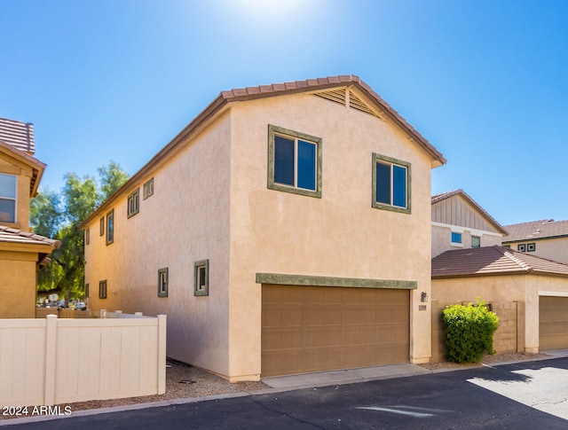 view of front of home with a garage