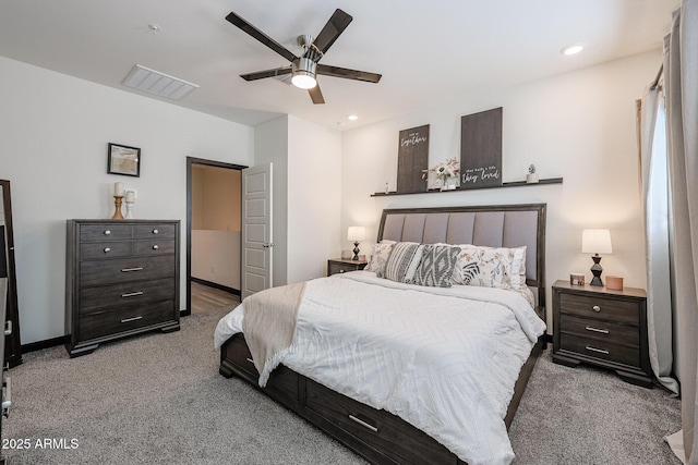 carpeted bedroom featuring baseboards, visible vents, recessed lighting, and a ceiling fan