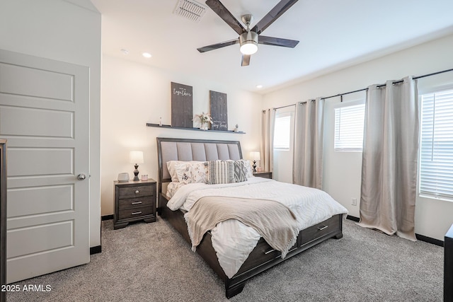 carpeted bedroom featuring baseboards, ceiling fan, visible vents, and recessed lighting