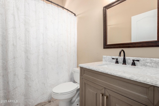 full bath with vanity and toilet