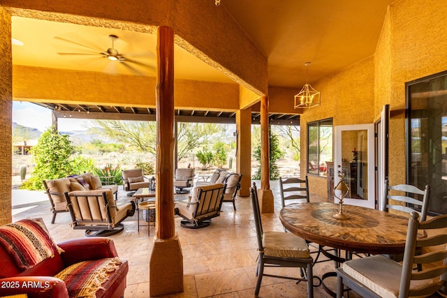 view of patio featuring outdoor dining area and an outdoor hangout area